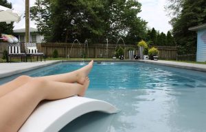 Tanning in a fiber glass pool